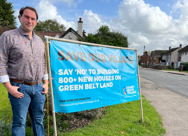 Conservative Parliamentary Candidate, James Spencer campaigning in Colney Heath against the proposed over development of the village